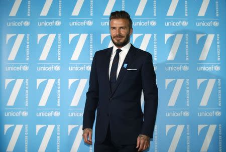 David Beckham attends a press conference to mark his 10 years as a UNICEF Goodwill Ambassador, at Google's headquarters in central London, February 9, 2015. REUTERS/Peter Nicholls