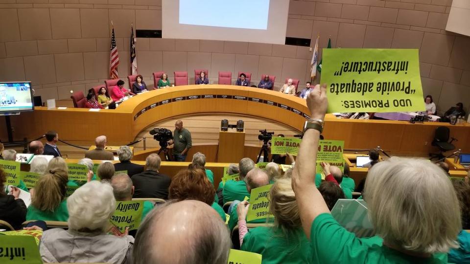 Residents pack the city council chambers to oppose a developer’s plan to add more than 600 homes between Elm Lane and Rea Road.