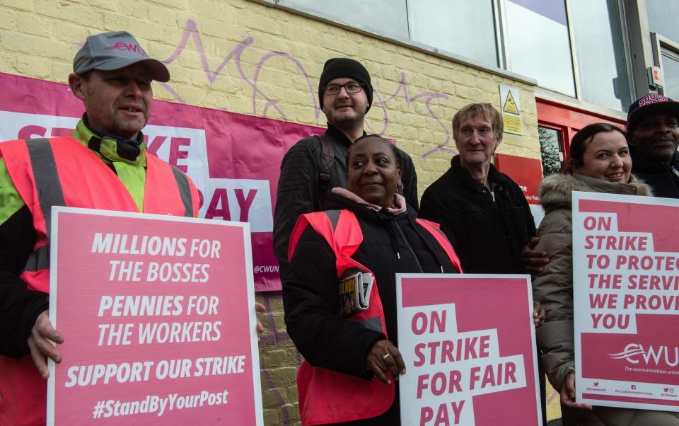 LONDON ENGLAND - NOVEMBER 24: Strikers from the CWU Trade Union attend the picket line at Peckham Royal Mail centre on November 24, 2022 in London, England. Strikes planned for the Black Friday weekend - Getty