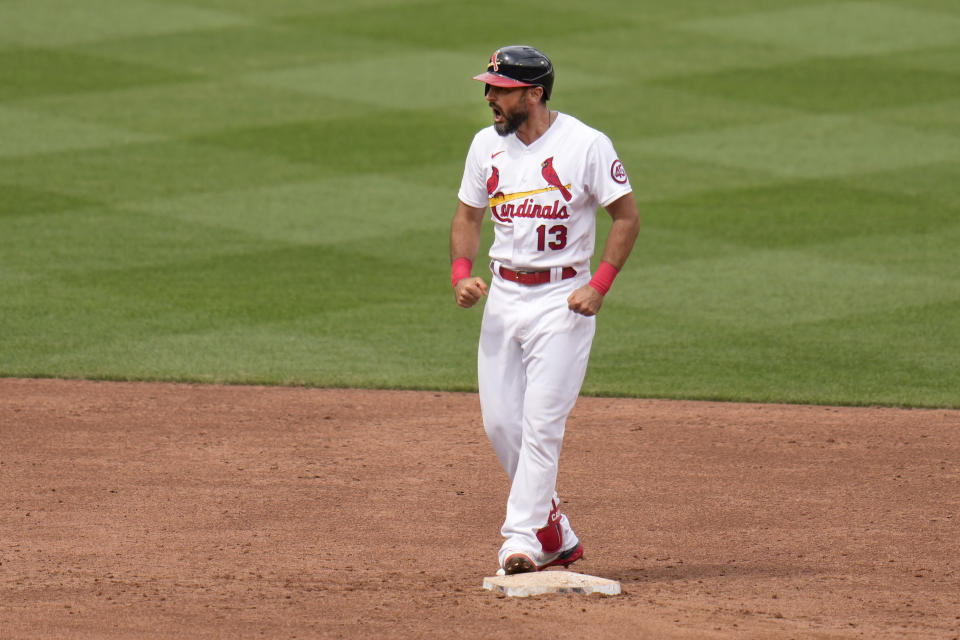 St. Louis Cardinals' Matt Carpenter celebrates after hitting a two-run double during the sixth inning of a baseball game against the Cincinnati Reds Sunday, June 6, 2021, in St. Louis. (AP Photo/Jeff Roberson)