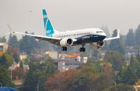 A Boeing 737 MAX lands at Boeing Field in Seattle on Wednesday, Sept. 30, 2020. FAA chief Steve Dickson, a pilot who flew for the military and Delta Air Lines, was expected to sit in the captain’s seat during a two-hour flight. The Max has been grounded since March 2019, after the second crash. (Mike Siegel/The Seattle Times via AP, Pool)