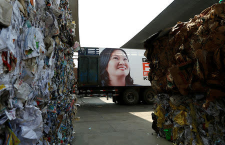 A picture of Peruvian presidential candidate Keiko Fujimori of Fuerza Popular (Popular Force) party is seen on a truck at a recycling plant in San Juan de Lurigancho in Lima, Peru, May 4, 2016. REUTERS/Mariana Bazo