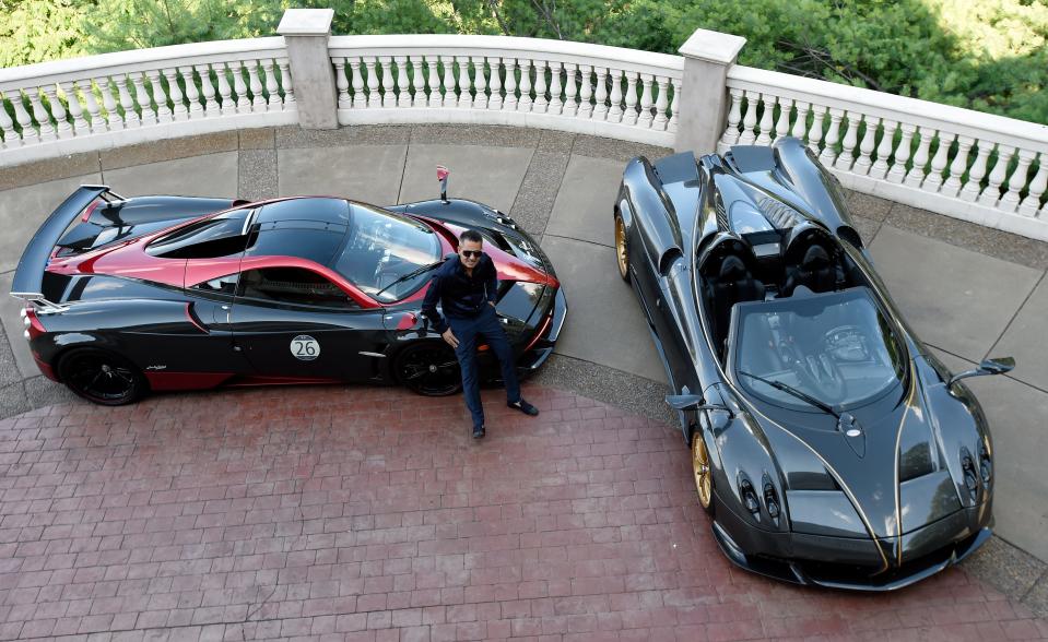 Sammy Poori with his two rare Pagani sports cars at his home on Wednesday, June 27, 2023, in Brentwood, Tenn.