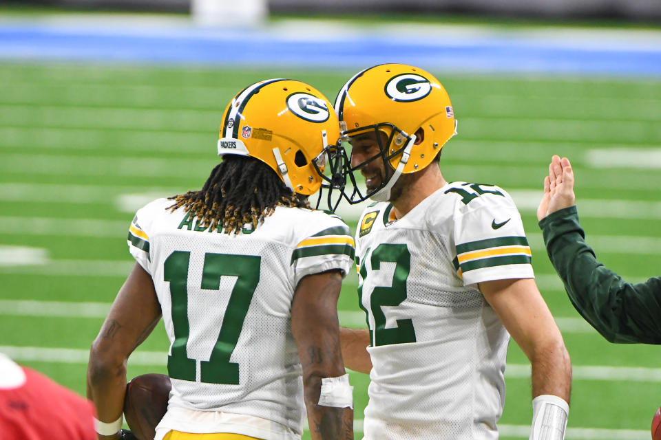 DETROIT, MI - DECEMBER 13: Green Bay Packers wide receiver Davante Adams (17) is congratulated by Green Bay Packers quarterback Aaron Rodgers (12) on his touchdown reception during the Detroit Lions versus Green Bay Packers game on Sunday December 13, 2020 at Ford Field in Detroit, MI. (Photo by Steven King/Icon Sportswire via Getty Images)