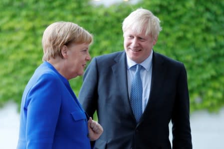 FILE PHOTO: German Chancellor Merkel meets Britain's Prime Minister Johnson at the Chancellery in Berlin