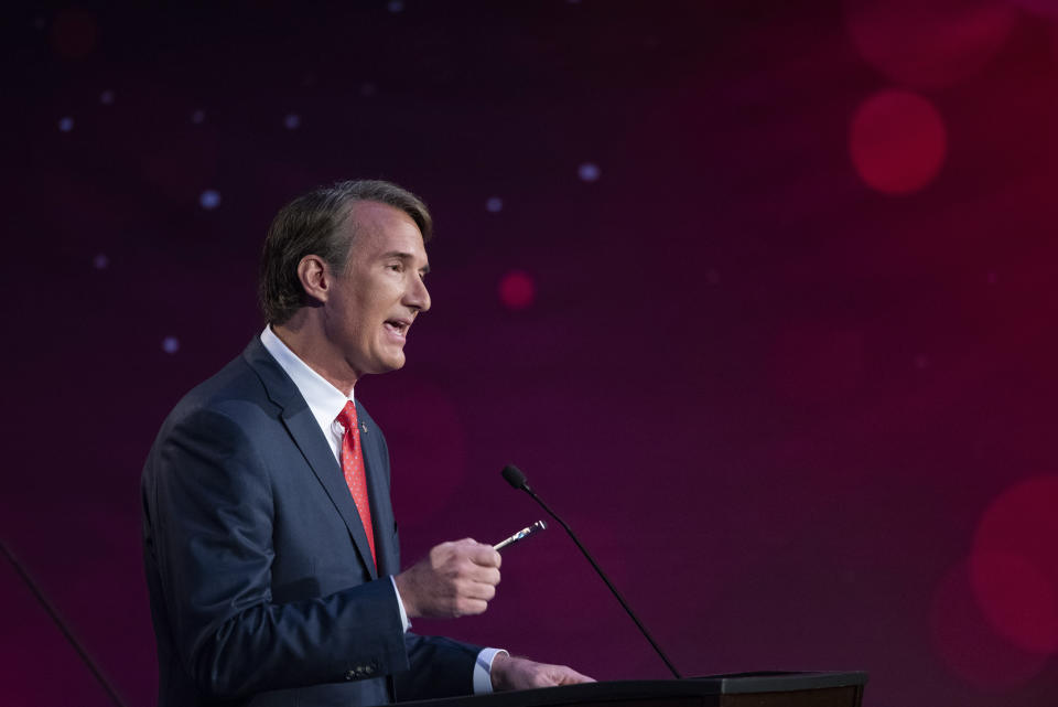 Virginia Republican gubernatorial candidate Glenn Youngkin participates in a debate with Democratic gubernatorial candidate and former Gov. Terry McAuliffe at Northern Virginia Community College, in Alexandria, Va., Tuesday, Sept. 28, 2021. (AP Photo/Cliff Owen)