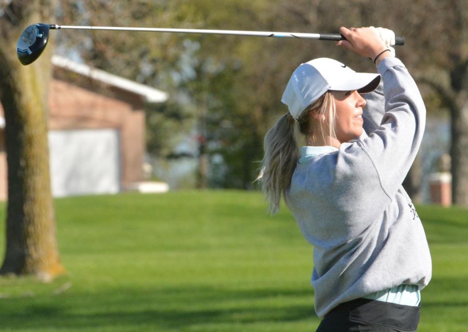 Darby Koenecke of Deuel watches her tee shot on No. 1 Red during the Pre-Region 1B/Eastern Coteau Conference golf tournament at Cattail Crossing Golf Course.