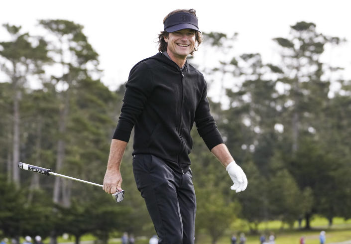 <p>Jason Bateman grins as he heads off the Spyglass Hill Golf Course green during the AT&T Pebble Beach Pro-Am golf tournament in the northern Californian seaside town on Feb. 2.</p>