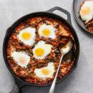 <p>You can make these three-ingredient tomato-simmered eggs with things you probably already have on hand in your freezer and pantry. To make these baked eggs more like eggs in purgatory, look for a spicy tomato sauce and don't forget some whole-wheat bread for dipping. <a href="https://www.eatingwell.com/recipe/264141/baked-eggs-in-tomato-sauce-with-kale/" rel="nofollow noopener" target="_blank" data-ylk="slk:View Recipe;elm:context_link;itc:0;sec:content-canvas" class="link ">View Recipe</a></p>