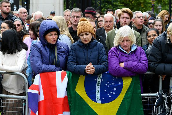 LONDON, ENGLAND - SEPTEMBER 19: Mourners at Westminster Abbey for the State Funeral of Queen Elizabeth II on September 19, 2022 in London, England. Elizabeth Alexandra Mary Windsor was born in Bruton Street, Mayfair, London on 21 April 1926. She married Prince Philip in 1947 and ascended the throne of the United Kingdom and Commonwealth on 6 February 1952 after the death of her Father, King George VI. Queen Elizabeth II died at Balmoral Castle in Scotland on September 8, 2022, and is succeeded by her eldest son, King Charles III.  (Photo by Joe Maher/Getty Images)