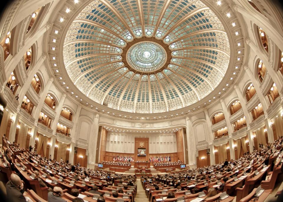 FILE - This Oct. 10, 2011 file photo shows the Parliament Palace in Bucharest, Romania. Twenty-three years after communism collapsed, the Palace of the Parliament, a gargantuan Stalinist symbol and the most concrete legacy of ex-dictator Nicolae Ceausescu, has emerged as an unlikely pillar of Romania's nascent democracy. And while it remains one of the most controversial projects of Ceausescu's 25-year rule, albeit one that has gradually found a place in the nation's psyche, it's also now a tourist attraction, visited by tens of thousands of Romanians and foreigners every year. (AP Photo/Vadim Ghirda, File)