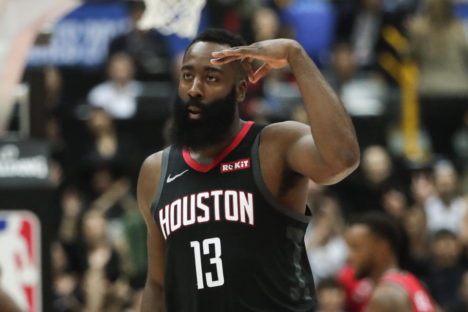 Houston Rockets' James Harden celebrates his three-point basket during the first half of an NBA preseason basketball game against the Toronto Raptors Tuesday, Oct. 8, 2019, in Saitama, near Tokyo. (AP Photo/Jae C. Hong)