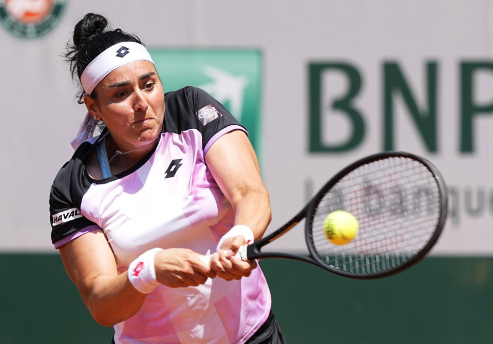 Tunisia's Ons Jabeur plays a return to United States's Coco Gauff during their fourth round match on day 9, of the French Open tennis tournament at Roland Garros in Paris, France, Monday, June 7, 2021. (AP Photo/Michel Euler)