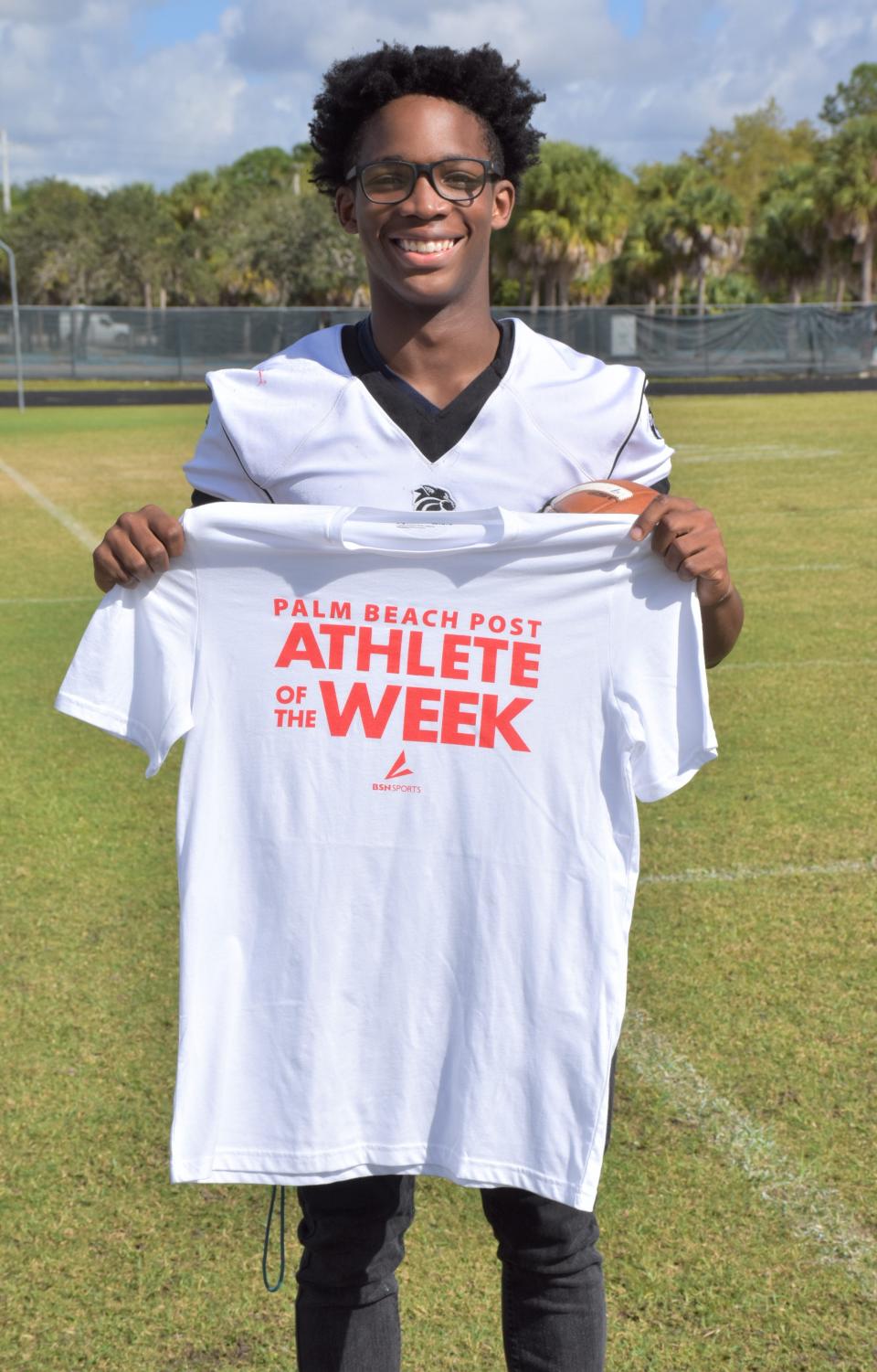 Royal Palm Beach's Garvan Dorival poses with his Athlete of the Week shirt on Nov. 10, 2023.