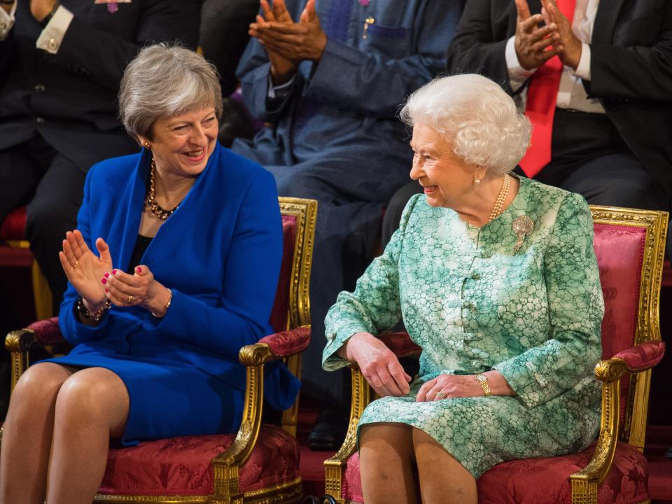 Theresa May and Queen Elizabeth in 2018, sitting next to each other