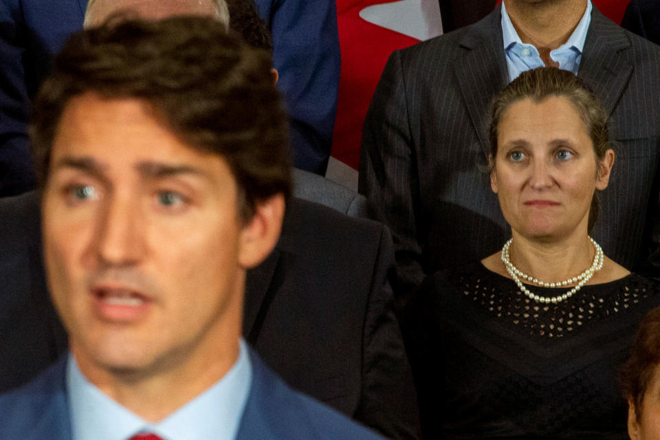 Canada's Foreign Minister Chrystia Freeland (R) watches as Prime Minister Justin Trudeau speaks during an election campaign stop in Toronto, Ontario, Canada September 20, 2019. REUTERS/Carlos Osorio