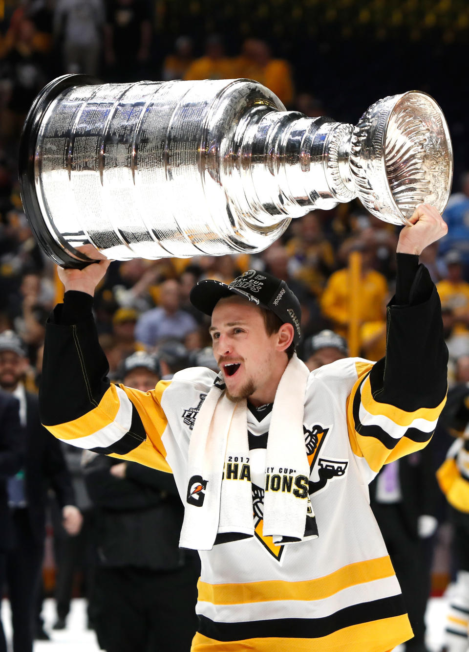 Dad-to-be Josh Archibald hoisted the Stanley Cup after the Penguins won their second straight title in June. (Photo: Justin K. Aller via Getty Images)