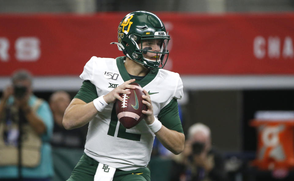 ARLINGTON, TX - DECEMBER 07: Charlie Brewer #12 of the Baylor Bears looks to throw against the Oklahoma Sooners in the first half of the Big 12 Football Championship at AT&T Stadium on December 7, 2019 in Arlington, Texas. (Photo by Ron Jenkins/Getty Images)