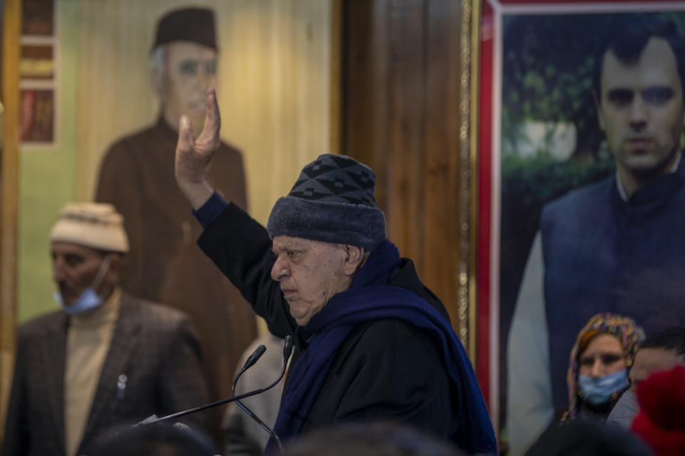 Jammu and Kashmir National Conference president Farooq Abdullah gestures as he speaks during a meeting with his party workers a day after the District Development Council elections results in Srinagar, Indian controlled Kashmir, Wednesday, Dec. 23, 2020. An alliance of political parties opposed to New Delhi’s policies in Kashmir has won a majority of seats in local elections, the first since New Delhi revoked the disputed region’s semiautonomous status and took direct control last year. The alliance, which is pro-India but favors self-governance for Kashmir, won 112 out of a total of 280 seats in District Development Council elections. (AP Photo/ Dar Yasin)