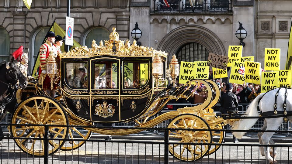 Protesters demonstrate ahead of the State Opening of Parliament opposite the Houses of Parliament in London in November. - Henry Nicholls/AFP/Getty Images