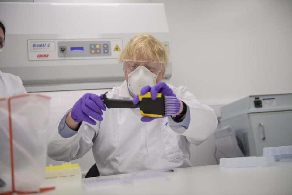 Prime Minister Boris Johnson during a visit to a laboratory at Valneva in Livingston where they will be producing a Covid 19 vaccine on a large scale (Wattie Cheung/Daily Mail) (PA Archive)