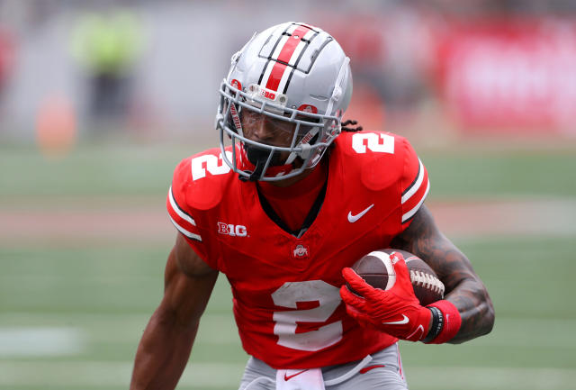 Ohio State Buckeyes receiver Marvin Harrison Jr. wears Louis