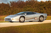 <p><span><span>The prototype XJ220 had a </span><span>V12 engine</span><span> and </span><span>four-wheel drive</span><span>, so the fact that the production version had a </span><span>3.5-litre V6</span><span> (admittedly boosted by two turbochargers) driving only the rear wheels was seen as a disappointment.</span></span></p><p><span><span>Despite that, this was the fastest road-going Jaguar ever, easily capable of </span><span>over 200mph</span><span>. Three decades after its 1992-1994 production run, during which fewer than 300 examples were built, it is still regarded as one of the world’s finest supercars.</span></span></p>
