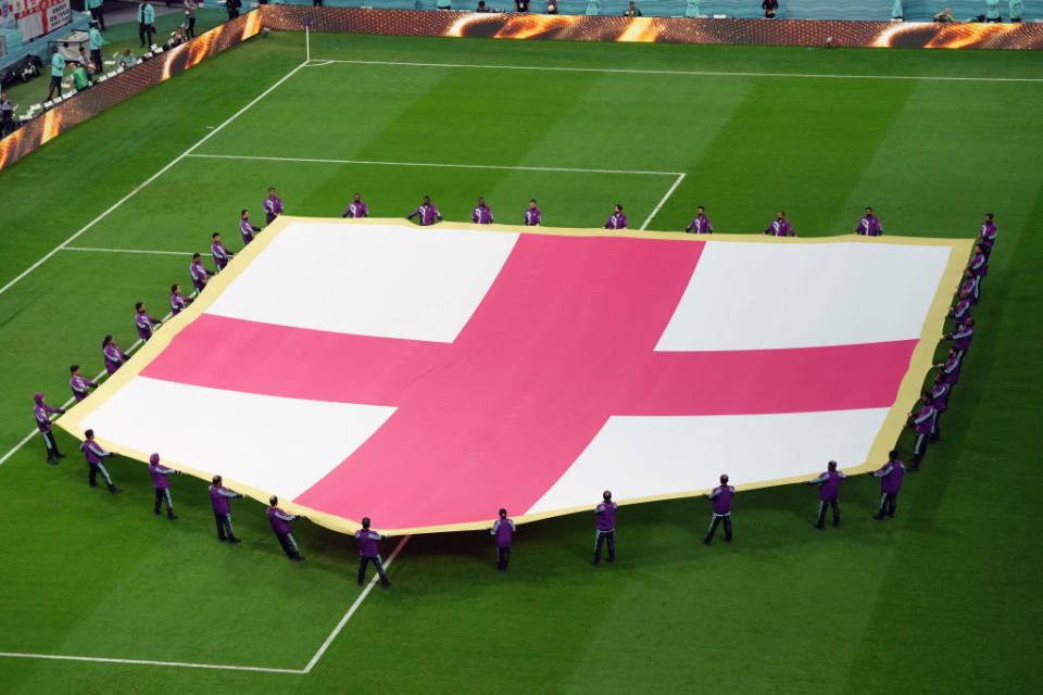 The Flag of St. George is presented at the FIFA World Cup in Qatar on Dec. 4, 2022. <span class="copyright">Nick Potts–PA Images/Getty Images</span>