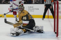 Vegas Golden Knights goaltender Logan Thompson (36) watches as he is scored on by New York Rangers center Mika Zibanejad for the second time during the third period of an NHL hockey game Wednesday, Dec. 7, 2022, in Las Vegas. (AP Photo/John Locher)