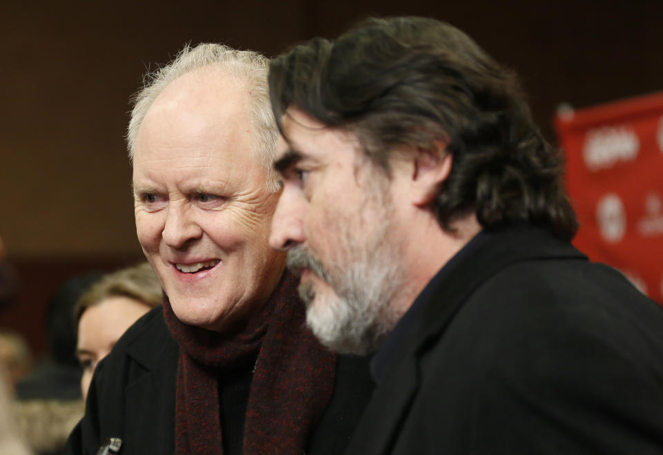 Cast members John Lithgow, left, and Alfred Molina, right, are interviewed at the premiere of the film "Love is Strange" during the 2014 Sundance Film Festival, on Saturday, Jan. 18, 2014, in Park City, Utah. (Photo by Danny Moloshok/Invision/AP)