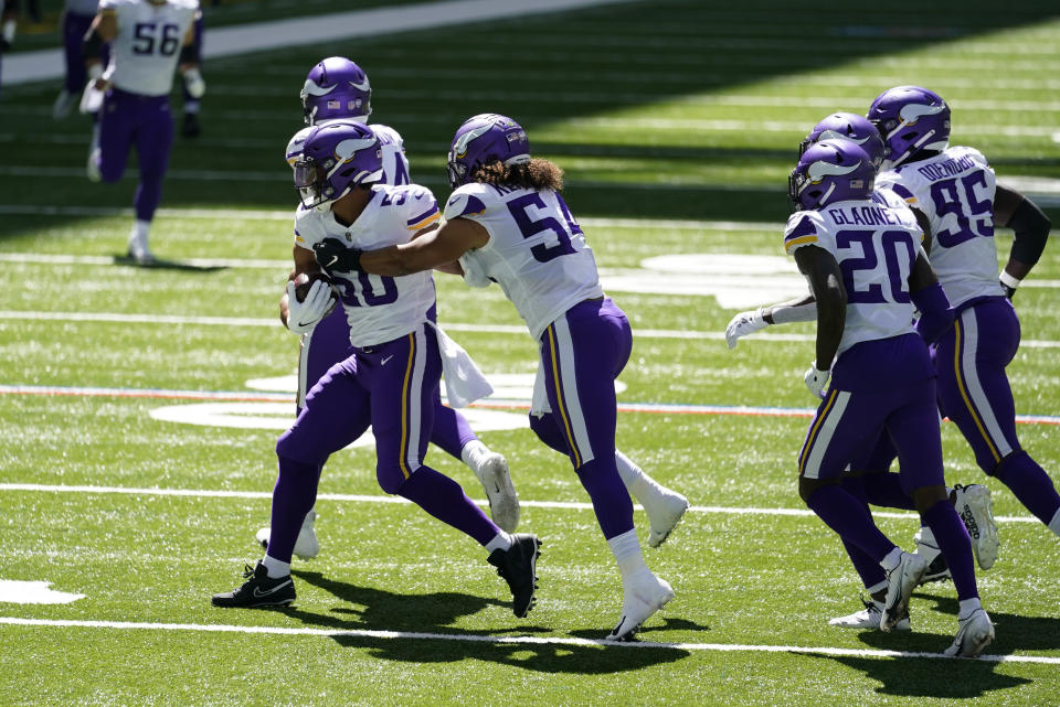 Minnesota Vikings linebacker Eric Wilson (50) celebrates an interception during the first half of an NFL football game against the Indianapolis Colts, Sunday, Sept. 20, 2020, in Indianapolis. (AP Photo/Michael Conroy)