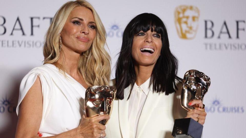 Tess Daley (L) and Claudia Winkleman (R) hold the award for the Best Entertainment category for 'Strictly Come Dancing' during the 2024 BAFTA TV Awards at the Royal Festival Hall in London, Britain, 12 May 2024. 