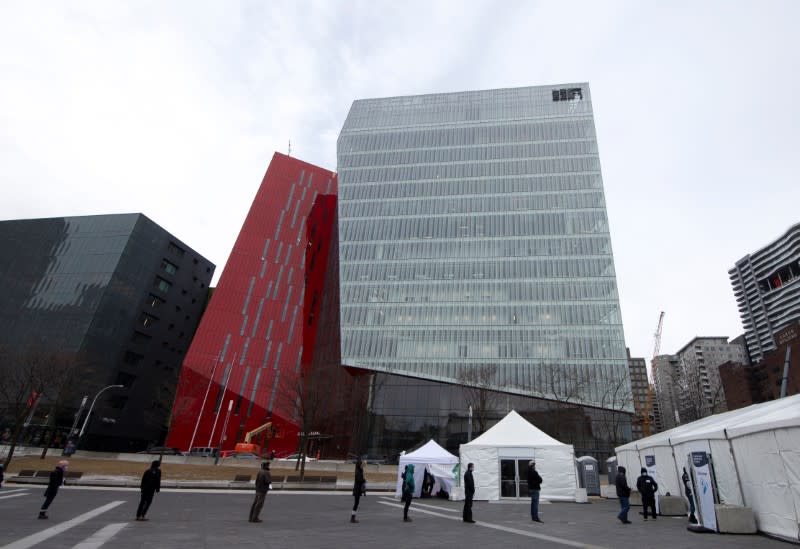 People line up as the city's public health unit holds a walk-in clinic testing for coronavirus disease (COVID-19) in Montreal