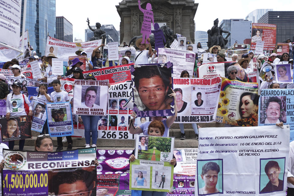 Mothers of disappeared children march to demand government help in the search for their missing loved ones on Mother's Day in Mexico City, Wednesday, May 10, 2023. (AP Photo/Marco Ugarte)