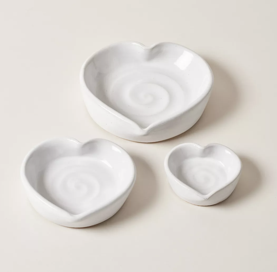 <p><a href="https://go.redirectingat.com?id=74968X1596630&url=https%3A%2F%2Fwww.anthropologie.com%2Fshop%2Ffarmhouse-pottery-heart-dishes%3Fcolor%3D010%26type%3DSTANDARD%26quantity%3D1&sref=https%3A%2F%2Fwww.womansday.com%2Frelationships%2Fdating-marriage%2Fg1414%2Fvalentines-day-gifts-women%2F" rel="nofollow noopener" target="_blank" data-ylk="slk:Shop Now;elm:context_link;itc:0;sec:content-canvas" class="link ">Shop Now</a></p><p>Heart Dishes</p><p>Anthropologie</p><p>$32.00</p><span class="copyright">Farmhouse Pottery</span>