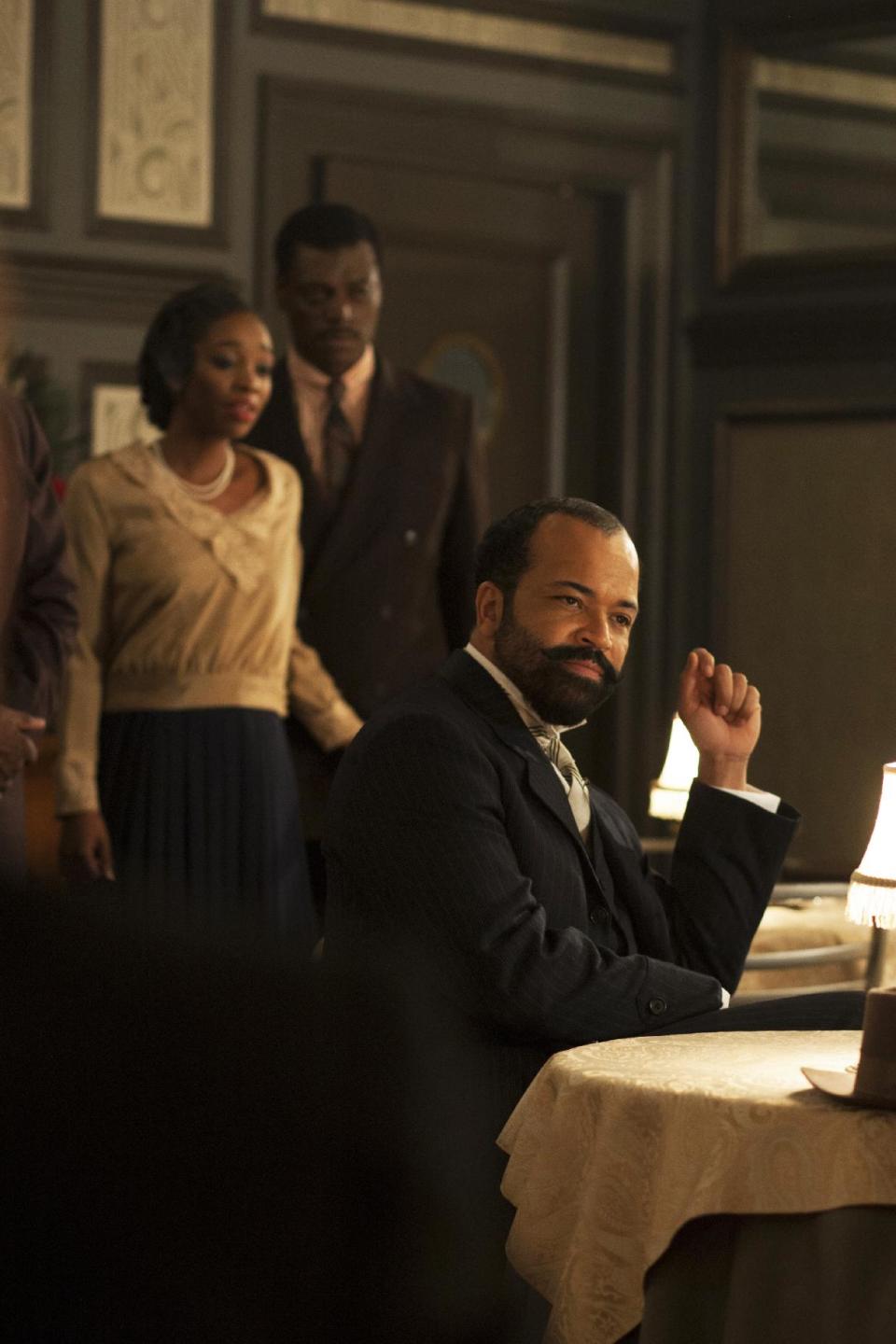 This photo provided by HBO shows, Jeffrey Wright, right, as Dr. Valentine Narcisse, and Christina Jackson, as Maybelle White, left, in a scene from season 4 of HBO's "Boardwalk Empire." (AP Photo/HBO, Paul Schiraldi Photography)
