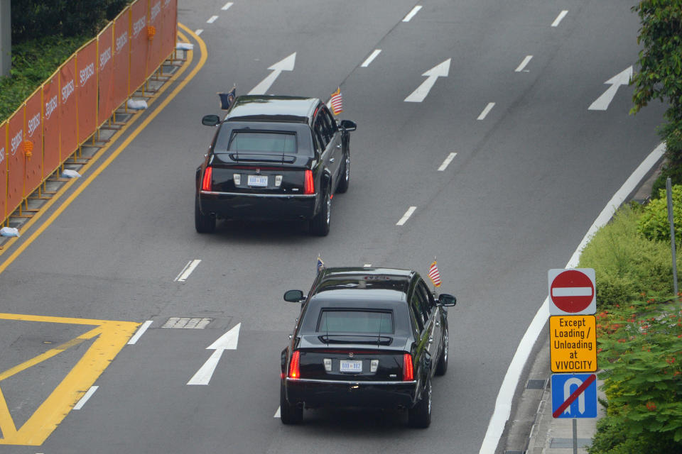 <p>The motorcade carrying US President Donald Trump sets off to Sentosa, the resort island where Trump is scheduled to meet with North Korea’s leader Kim Jong Un for a U.S.-North Korea summit, in Singapore on June 12, 2018. (Photo: Ted Aljibe/AFP/Getty Images) </p>