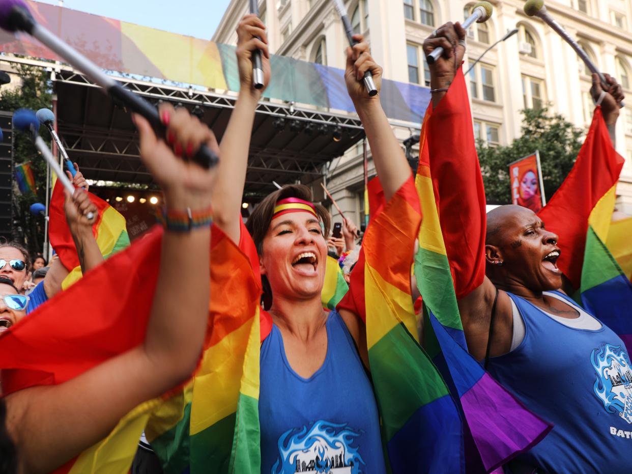 <p>Drummers join revelers as they gather in front of the Stonewall Inn to listen to speakers on June 28, 2019 in New York City. </p> (Getty Images)