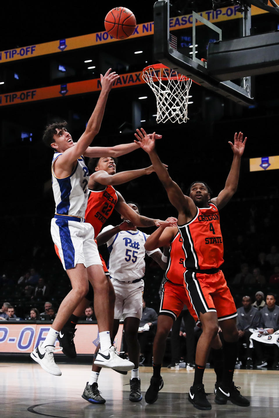 Pittsburgh forward Guillermo Diaz Graham, left, drives to basket during the first half of an NCAA college basketball game against the Oregon St in the NIT Season Tip-Off, Friday, Nov. 24, 2023, in New York. (AP Photo/Eduardo Munoz Alvarez)