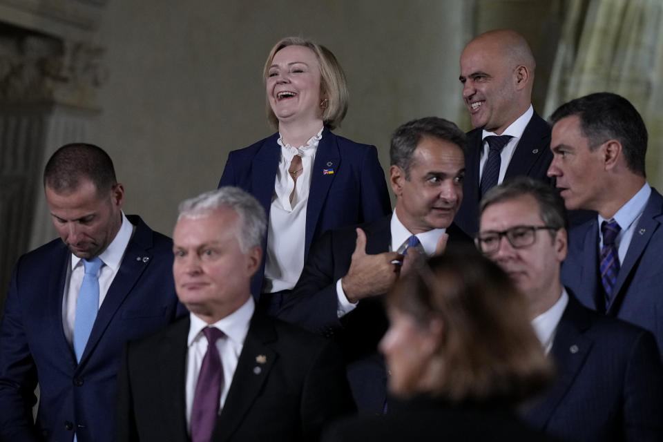 British Prime Minister Liz Truss, top left, speaks with North Macedonia's Prime Minister Dimitar Kovacevski, top right, at a group photo during a meeting of the European Political Community at Prague Castle in Prague, Czech Republic, Thursday, Oct 6, 2022. Leaders from around 44 countries are gathering Thursday to launch a "European Political Community" aimed at boosting security and economic prosperity across the continent, with Russia the one major European power not invited. (AP Photo/Alastair Grant, Pool)