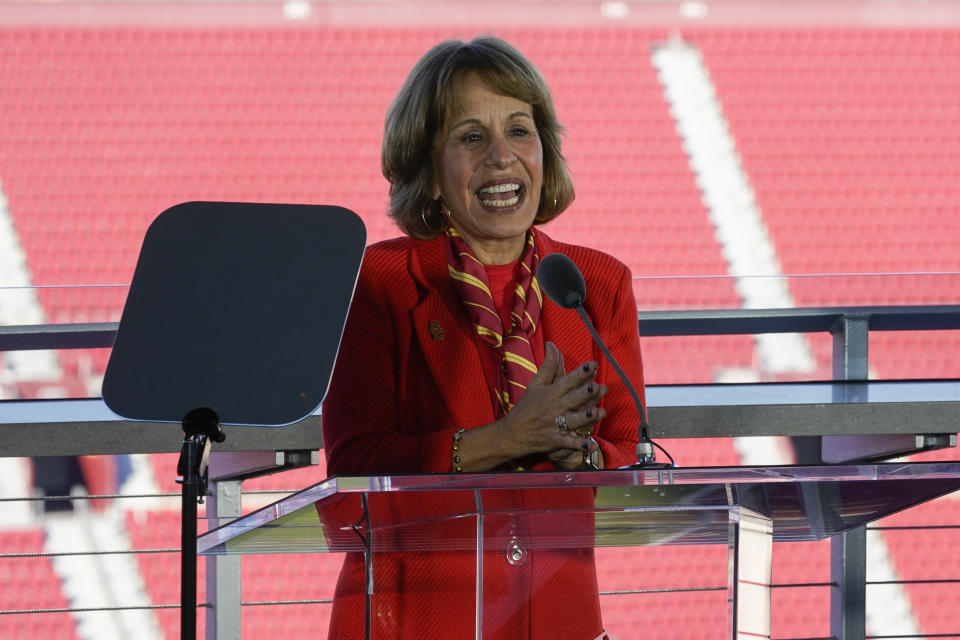 University of Southern California President Carol L. Folt introduces the new head football coach, Lincoln Riley, in Los Angeles, Monday, Nov. 29, 2021. (AP Photo/Ashley Landis)