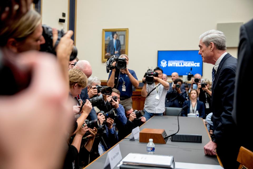 Former special counsel Robert Mueller returns from a short break while testifying before the House Intelligence Committee hearing on his report on Russian election interference, on Capitol Hill, in Washington on July 24, 2019.