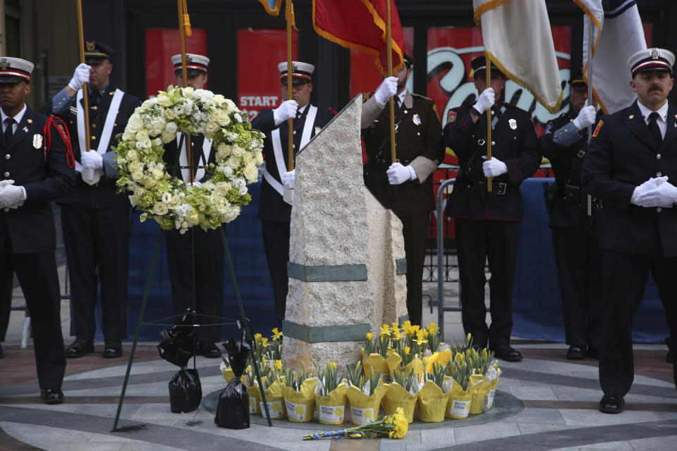 Emergency responders gather at a memorial for victims of the 2013 Boston Marathon bombing, Saturday April 15, 2023, in Boston. (AP Photo/Reba Saldanha)