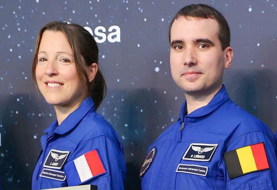 Sophie Adenot and Raphaël Liégeois in their blue astronaut uniforms