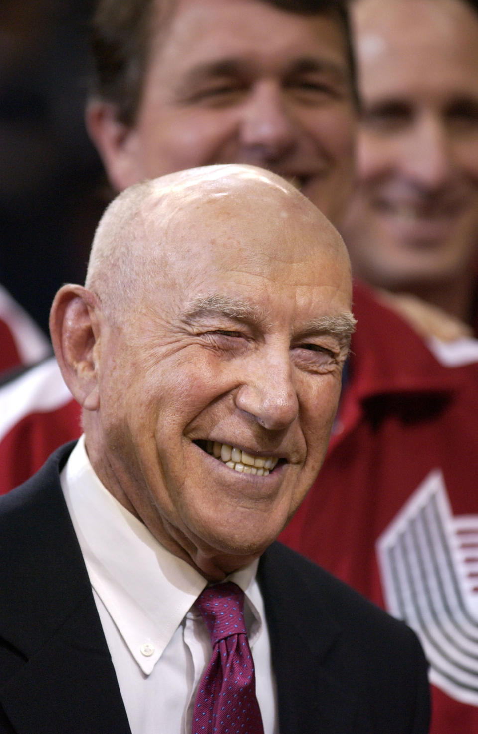 FILE - In this Sunday, April, 14, 2002, file photo, former Portland Trail Blazers coach Jack Ramsay smiles during a special 25th anniversary reunion of the Trail Blazers' 1976-77 championship team at halftime of their NBA basketball game against the Los Angeles Lakers, in Portland, Ore. Ramsay, a Hall of Fame coach who led the Portland Trail Blazers to the 1977 NBA championship before he became one of the league's most respected broadcasters, has died following a long battle with cancer. He was 89. (AP Photo/Shane Young, File)