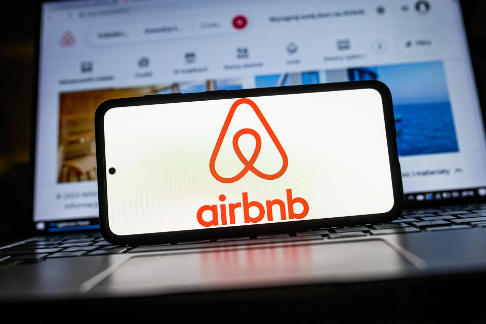 POLAND - 2023/01/20: In this photo illustration an Airbnb logo seen displayed on a smartphone. (Photo Illustration by Mateusz Slodkowski/SOPA Images/LightRocket via Getty Images)