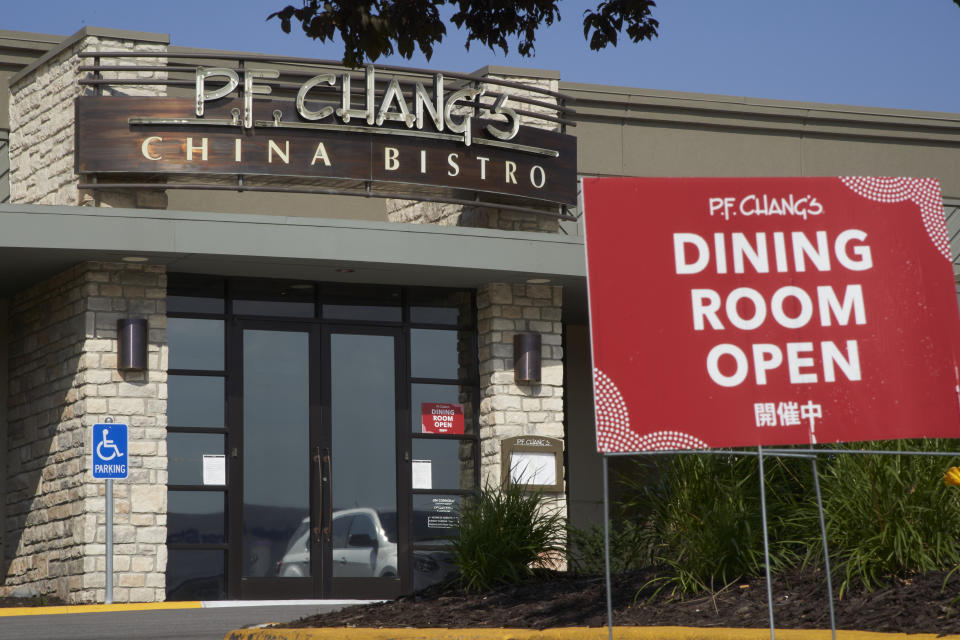 A P.F. Chang China Bistro restaurant is seen in Omaha, Neb., Tuesday, July 7, 2020. The restaurant is among big corporate names on the government’s list of 650,000 recipients of coronavirus relief loans despite the controversy that prompted other high-profile businesses to return billions of dollars in loans. P.F. Chang’s China Bistro said its loan of between $5 million and $10 million helped keep 12,000 workers employed as it transitioned its over 210 restaurants to take-out. (AP Photo/Nati Harnik)