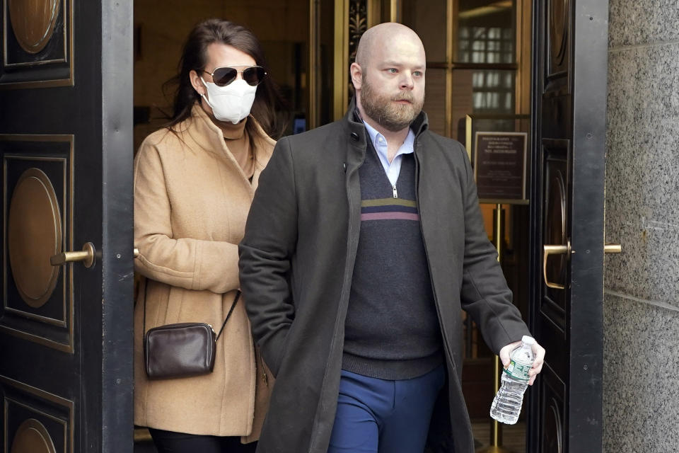 Juror No. 50, right, from the Ghislaine Maxwell trial, leaves federal court, in New York, Tuesday, March 8, 2022. The juror told a judge Tuesday that failing to disclose his child abuse history during jury selection at the trial of the British socialite was one of the "biggest mistakes" of his life, as a judge and lawyers try to decide whether the revelations will spoil Maxwell's sex trafficking conviction. (AP Photo/Richard Drew)