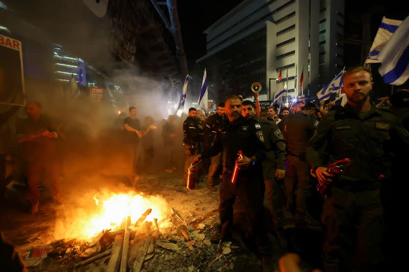 People protest against Israeli Prime Minister Netanyahu's government and call for the release of hostages, in Tel Aviv