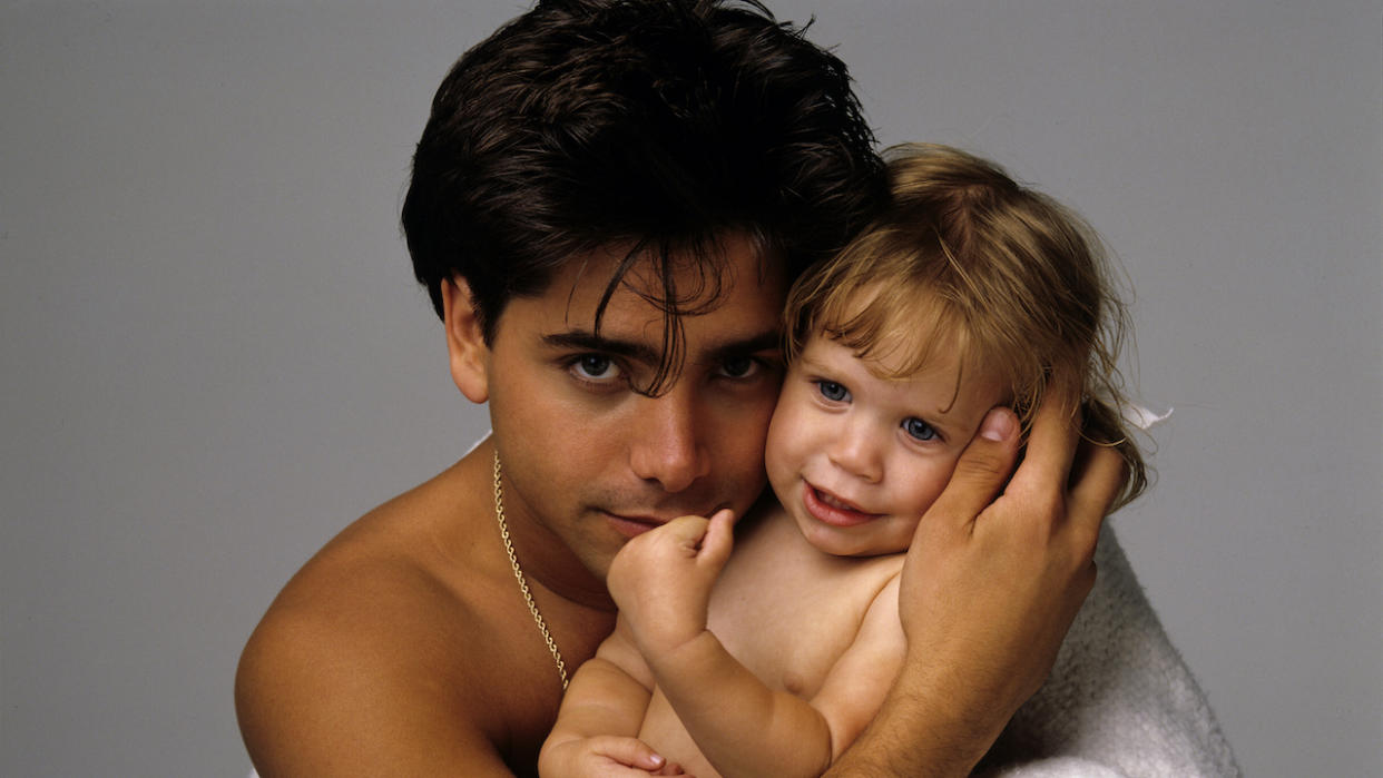  John Stamos with baby Mary Kate/Ashley Olsen  